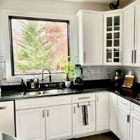 Kitchen with black picture window